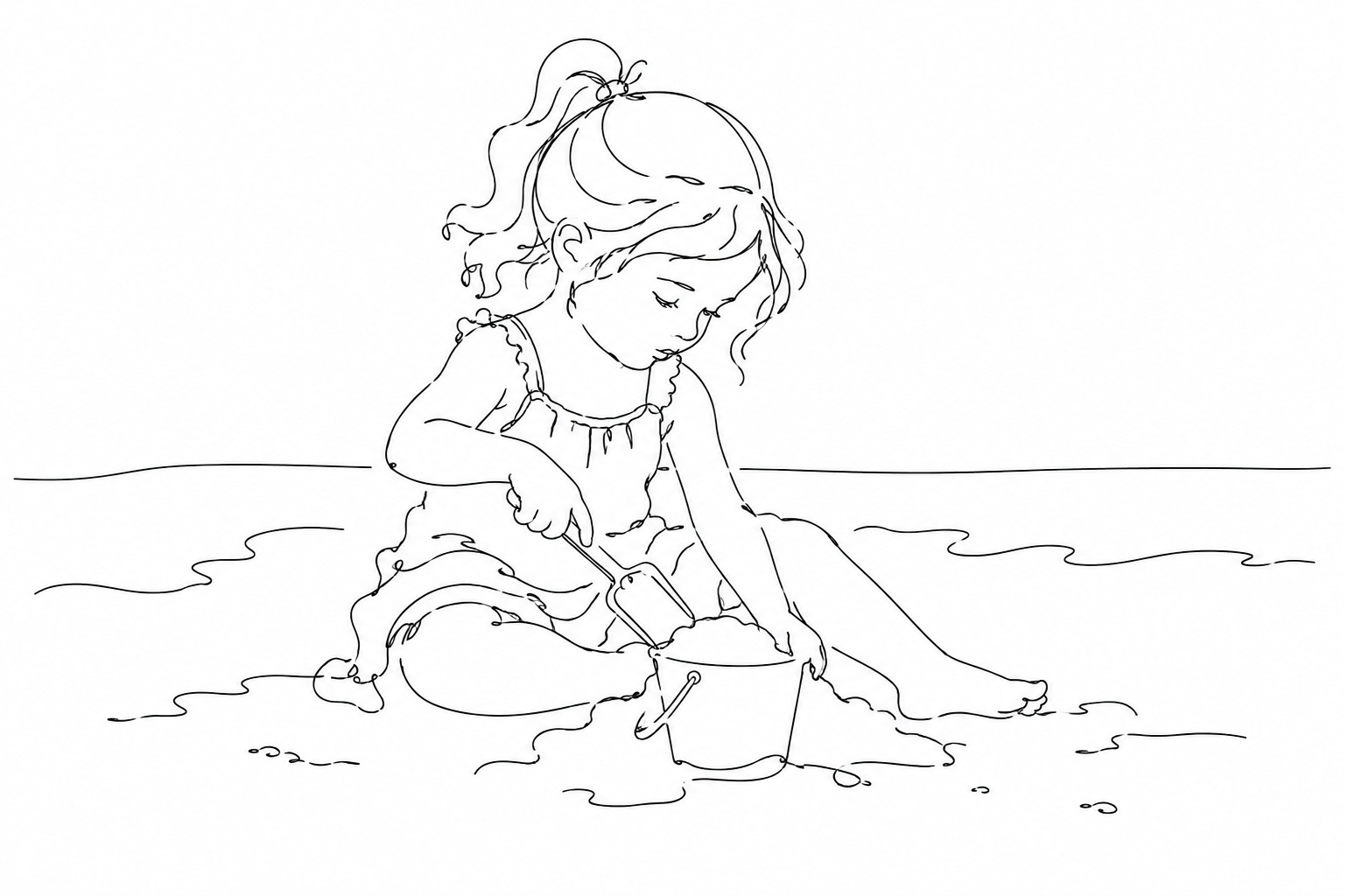 Petite fille sur le sable